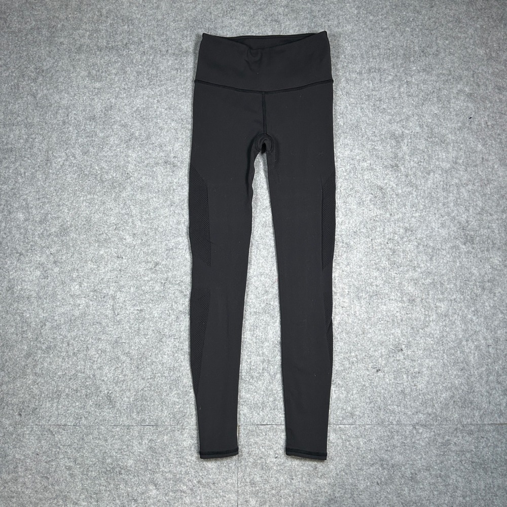 Lululemon reveal 7/8 tight leggings women's size 2 black athleisure yoga workout